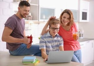child being homeschooled by parents